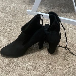 Never worn pair of high heeled boots! Size 9